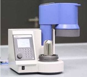 C 1 Calorimeter from IKA. Reaction occurs inside steel vessel. Water jacket swings over and down to enclose/isolate vessel.