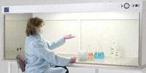 Horizontal laminar flow hood with airfoils along front and sides