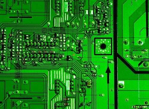 How does an Ionizing Blow-Off Gun improve product quality?